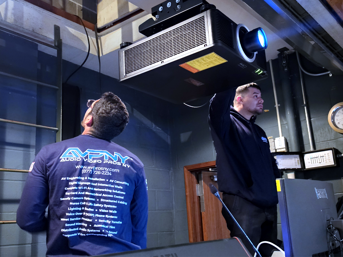 AV Pros NY technicians working on an audiovisual installation